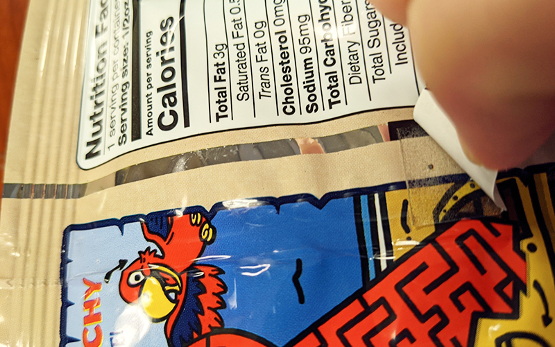 Applying the UGlu Dash to the potato chip bag