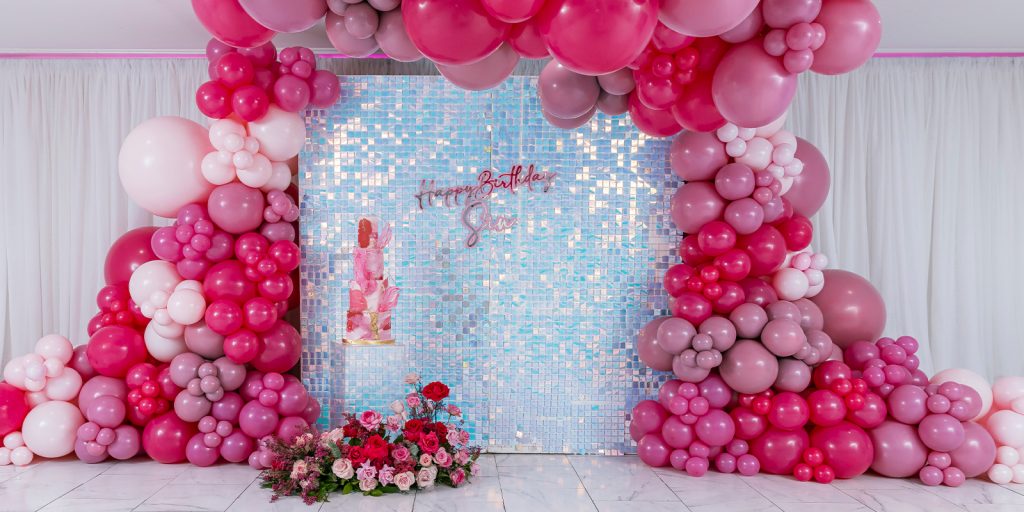 Hot Pink and silver balloons decoration for a birthday party.