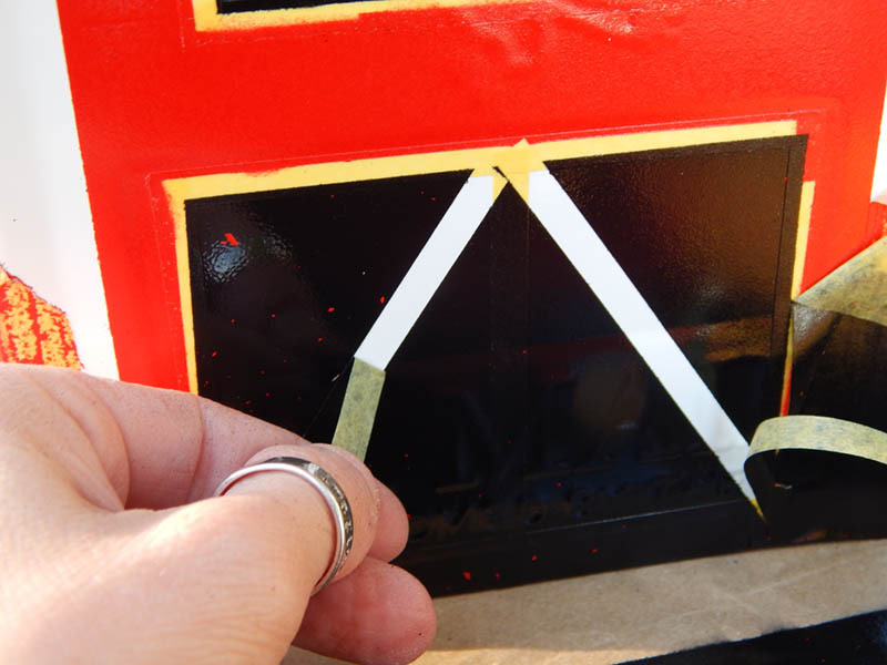 Peeling the masking tape off - look how sharp the edges are!