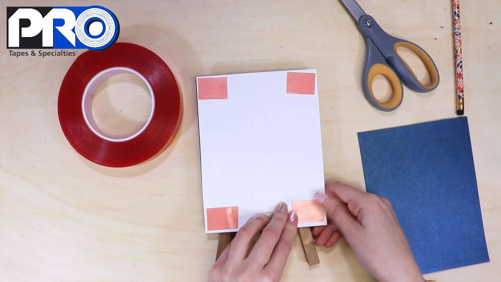 Attach the dark blue cardstock layer next with Pro® 965 tape
