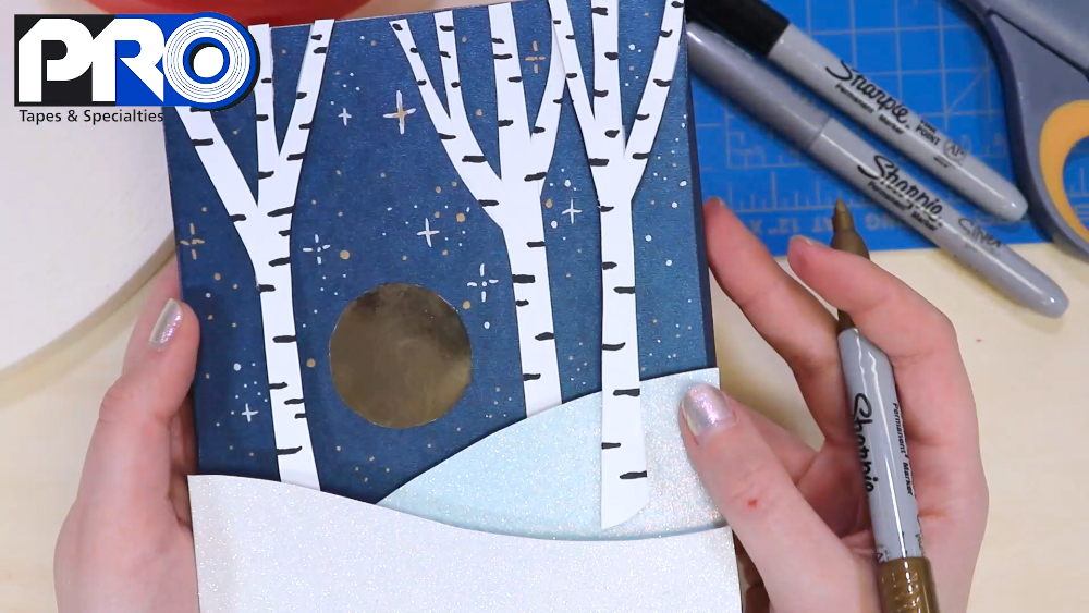 Complete your layered paper artwork with some stars, made with Metallic Gold and Silver Sharpies