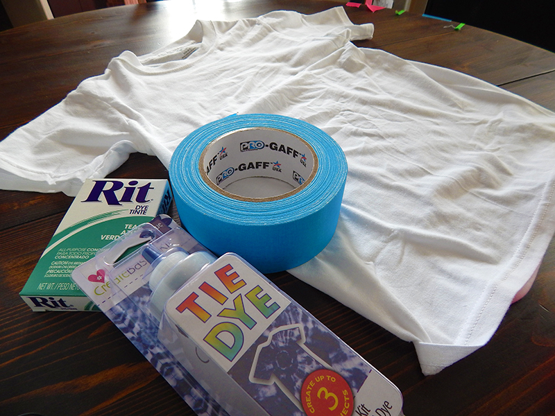 A white tshirt, Pro Gaff® tape, and Rit fabric dye, all ready for our tie-dye tshirt project!