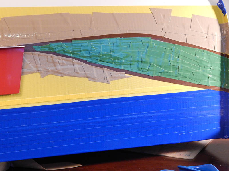 Using X-Acto knife to cut and layer tape